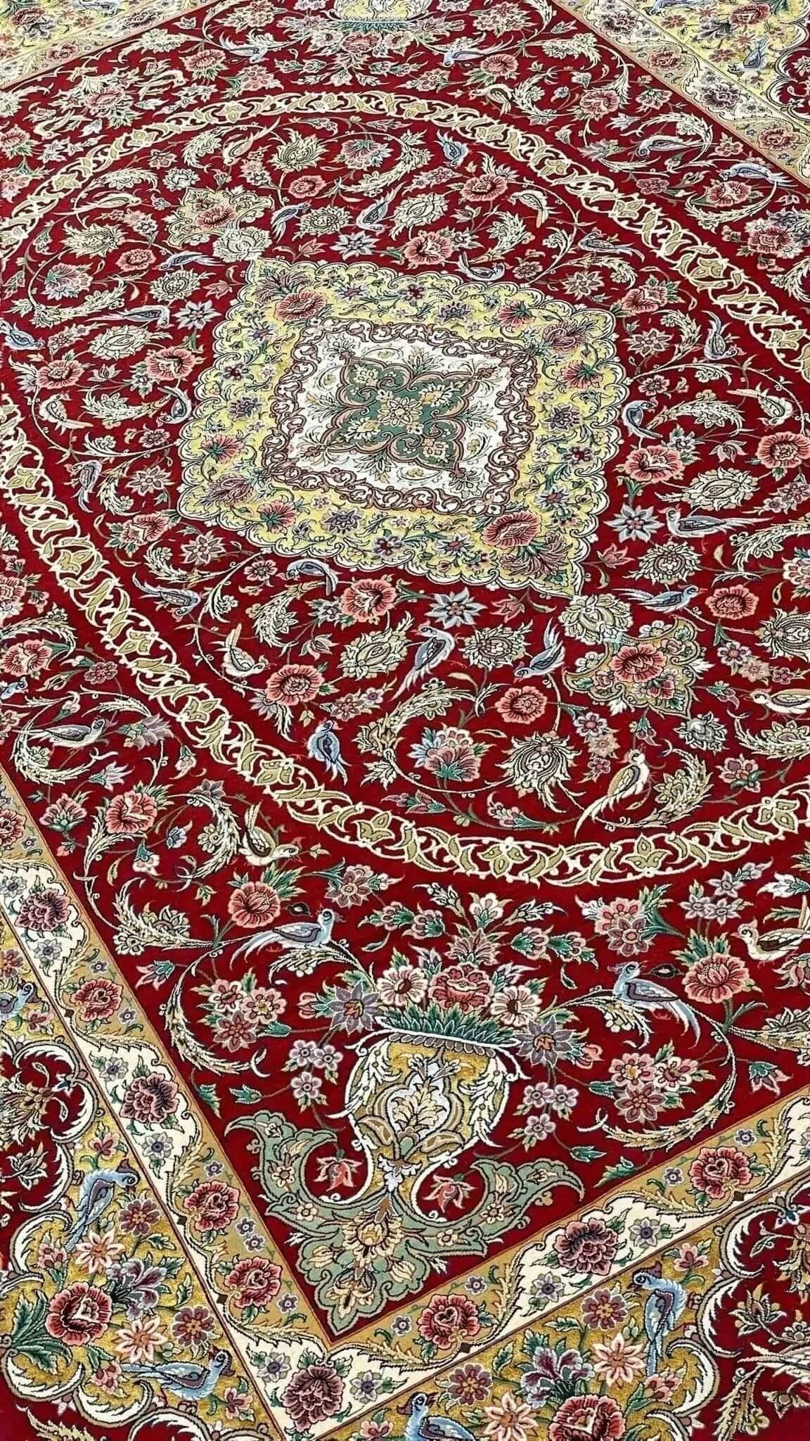 "Luxury red Isfahan Persian rug, handwoven with wool and silk flowers, measuring 240x160 cm. High knot density of 1,000,000 knots per m²."
